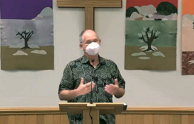 jim preaches at the church